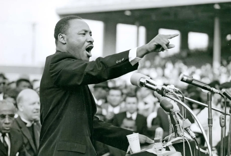 Martin Luther King, Jr. exhorts a crowd